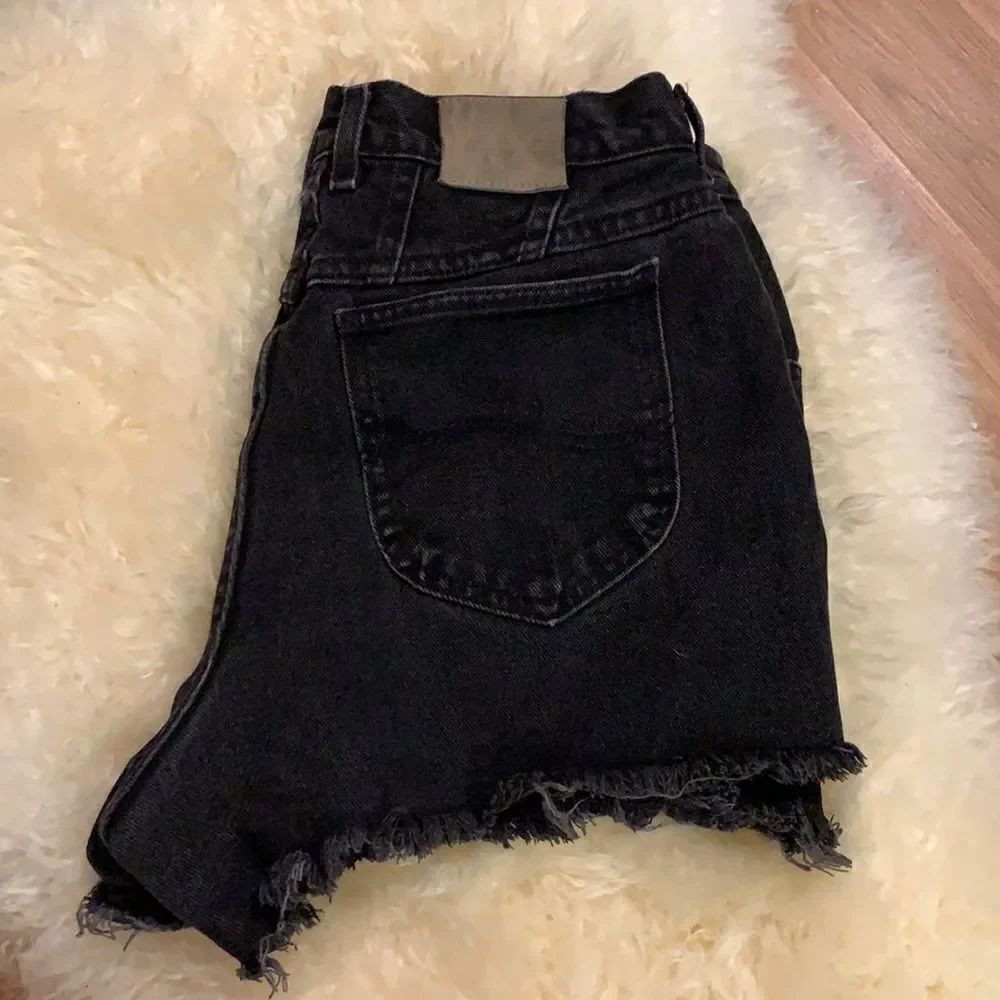 Vintage Lee high waist black cut off shorts